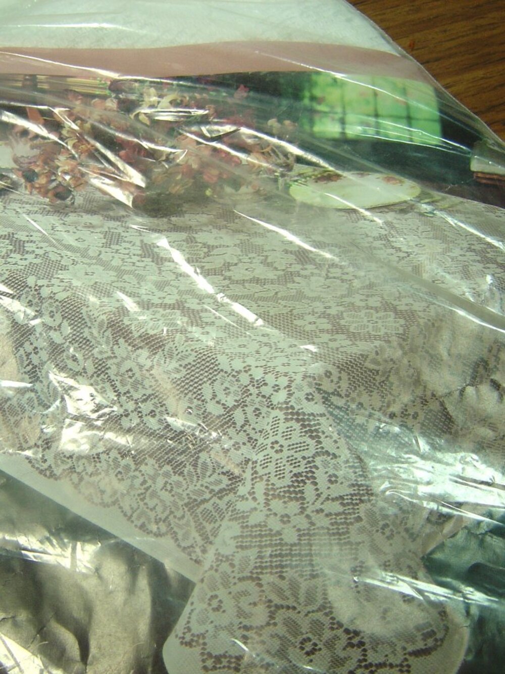 White lace Rhapsody tablecloth-60" x 104"--new in package